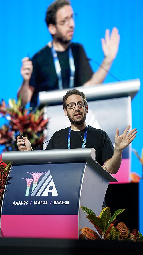 Daniel Whiteson at AAAI 2026 in Singapore for invited talk "Fundamental physics and science communication"