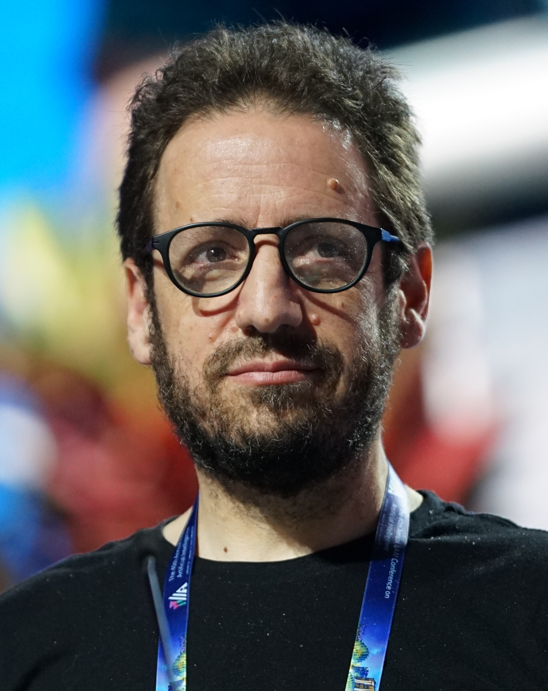 Daniel Whiteson at AAAI 2026 in Singapore for invited talk "Fundamental physics and science communication"