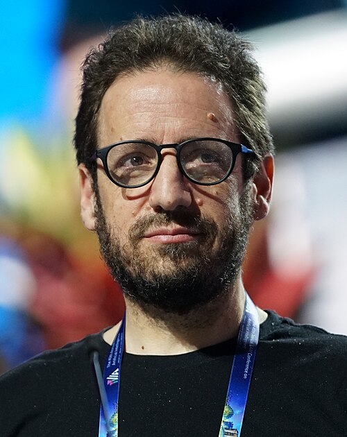 Daniel Whiteson at AAAI 2026 in Singapore for invited talk "Fundamental physics and science communication"