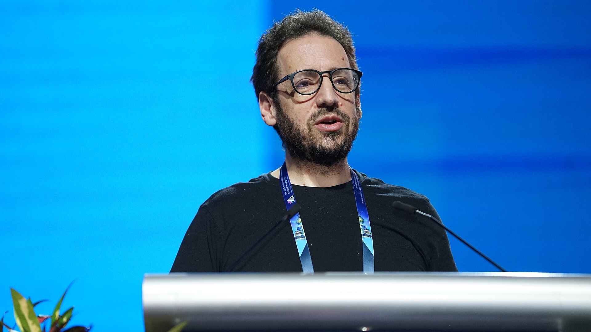 Daniel Whiteson at AAAI 2026 in Singapore for invited talk "Fundamental physics and science communication"