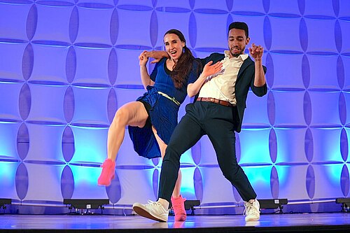 AJ Howard & Laura Glaess, dancers & instructors, performing the Lindy Hop at California Dance Festival 2025 in Sacramento, California.aj how