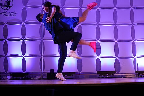AJ Howard & Laura Glaess, dancers & instructors, performing the Lindy Hop at California Dance Festival 2025 in Sacramento, California.aj how
