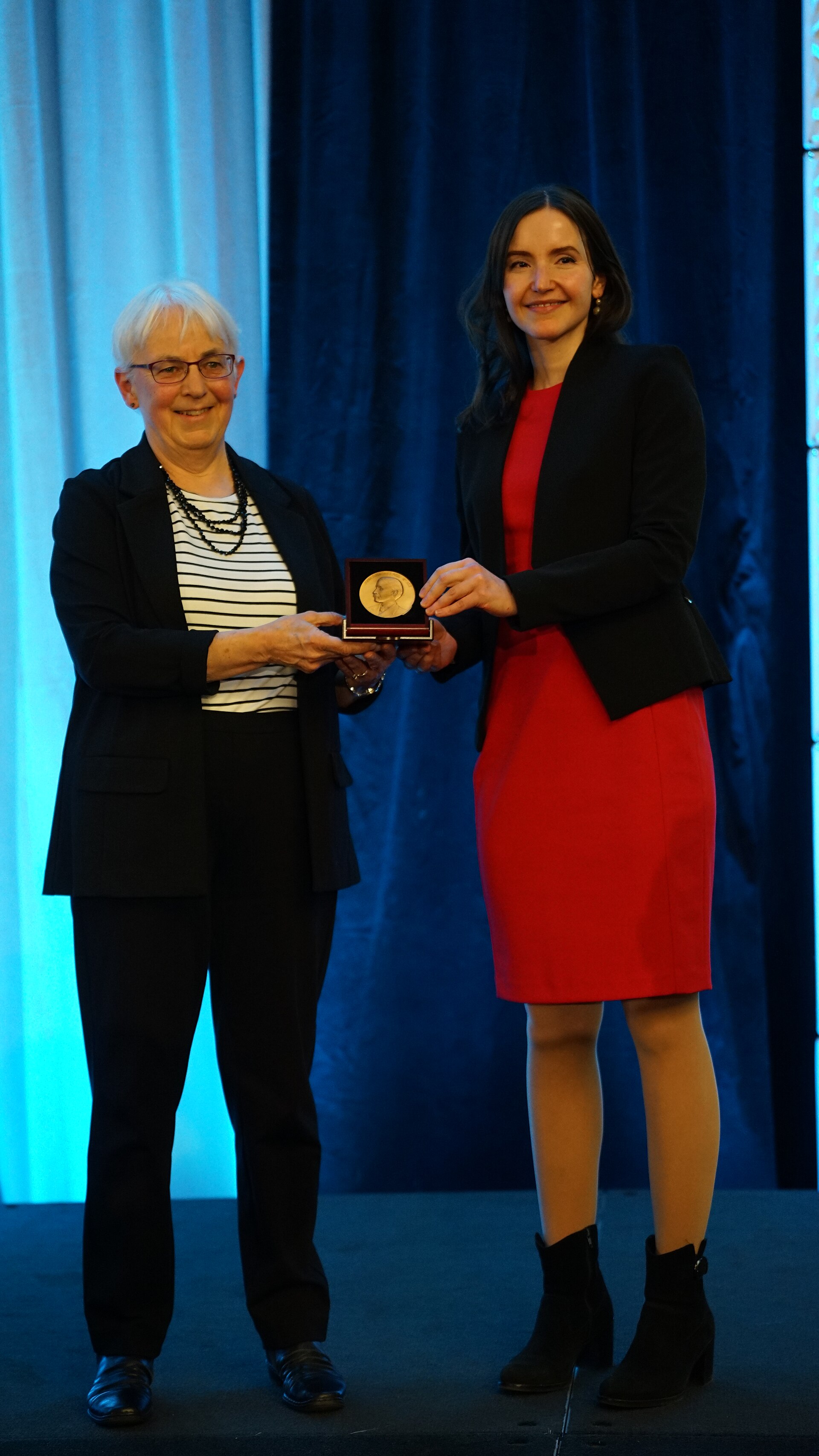 Stefanie Stantcheva being awarded the John Bates Clark Medal by Katharine Abraham at the ASSA (AEA) Annual Meeting 2026 in Philadelphia, PA