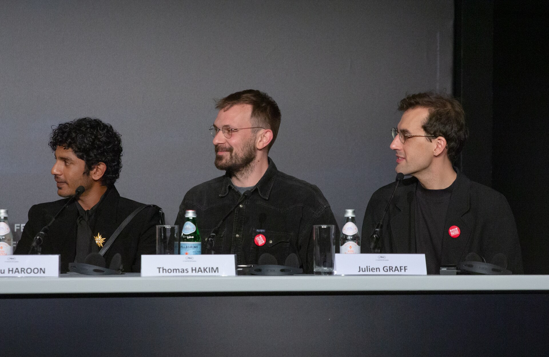 Actor Hridhu Haroon, Producers Thomas Hakim and Julien Graff at  All We Imagine As Light Press Conference at 2024 Cannes Film Festival