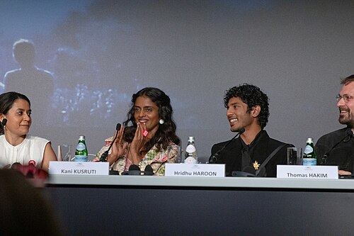 Actress Kani Kusruti and actor Hridhu Haroon at All We Imagine As Light Press Conference at 2024 Cannes Film Festival