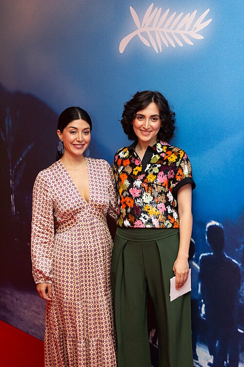 Actresses Niousha Akhshi and Mahsa Rostami at 2024 Cannes Film Festival for the film, The Seed of the Sacred Fig