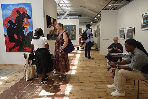 Visitors at the inaugural Africa Basel house at Art Basel 2025