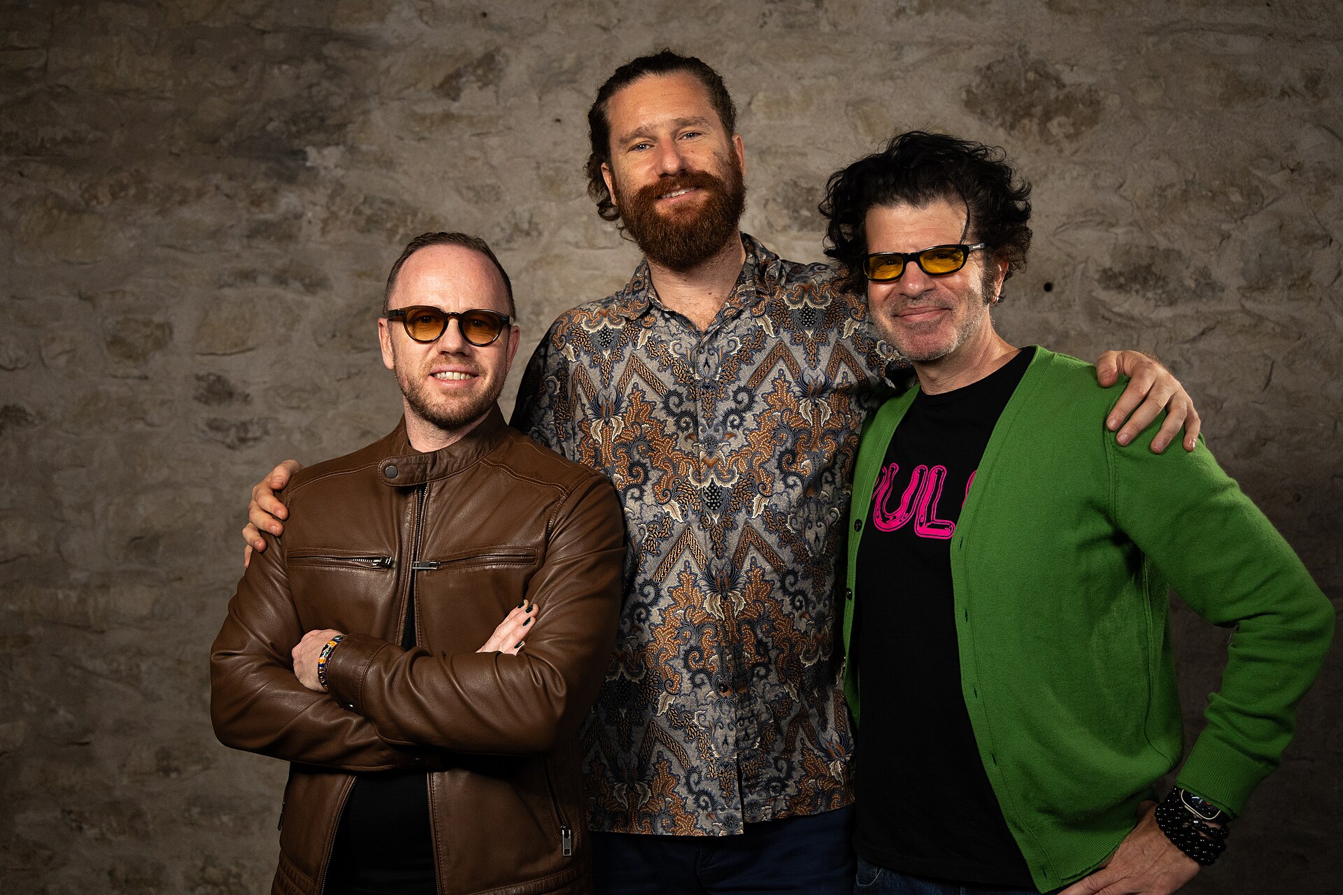 Alan R. Milligan, Jake Wachtel, and Daniel Raymont at the WikiPortraits studio at the 2025 SXSW Festival.
