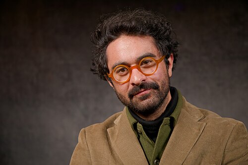 Alexi Horowitz-Ghazi, host and reporter at NPR Planet Money from Santa Fe, New Mexico, at the WikiPortraits studio at the 2025 Sundance Film Festival.