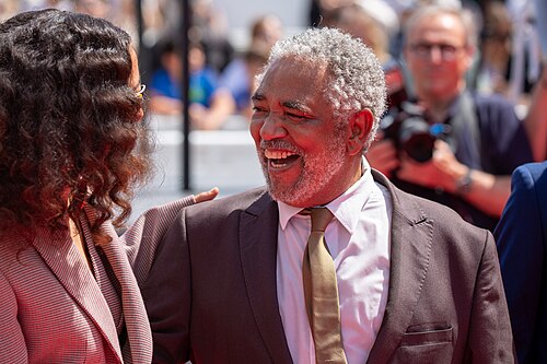 Alice Carvalho and Carlos Francisco at 2025 Cannes Red Carpet for O Agente Secreto