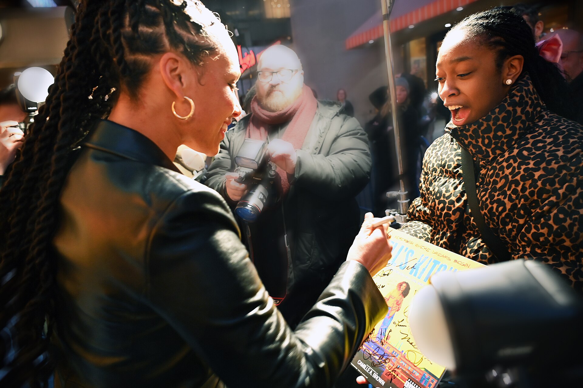 Alicia Keys and a fan at the first anniversary celebration for "Hell's Kitchen" on Broadway, April 2025