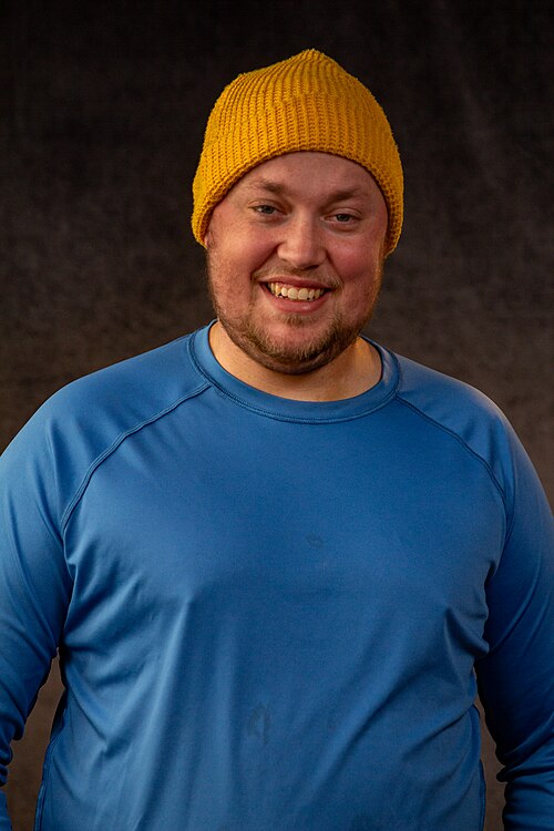 Andrew Seth Cohen, director of publicity at Impact24 PR and co-founder and animation director at Confidential Creative from Los Angeles, California, at the WikiPortraits studio at the 2025 Sundance Film Festival.