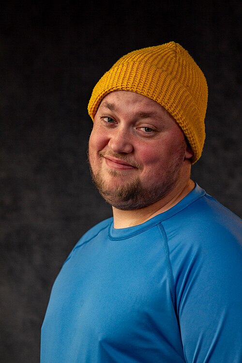 Andrew Seth Cohen, director of publicity at Impact24 PR and co-founder and animation director at Confidential Creative from Los Angeles, California, at the WikiPortraits studio at the 2025 Sundance Film Festival.