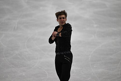MILAN, ITALY - 10 FEBRUARY 2026: Andrew Torgashev of United States competes during the Figure Skating Men Single Skating Short Program at the Olympic Winter Games Milano Cortina 2026 Milano Ice Skating Arena on February 10, 2026 in Milan, Italy