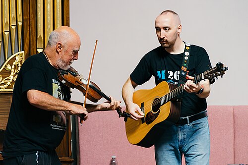 Attila the Stockbroker and Callum Baird (L-R) performing at the 2025 Edinburgh Festival Fringe