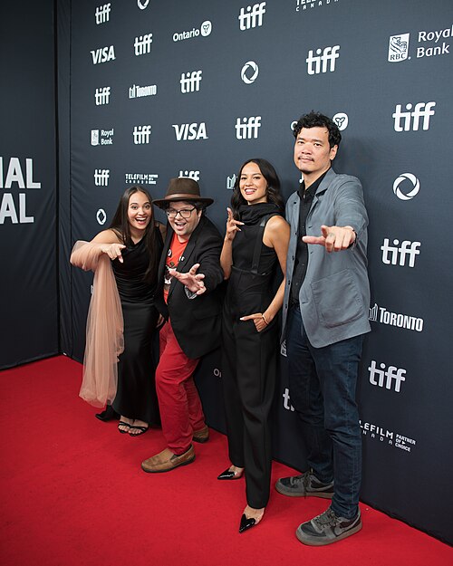 Aurora Ribero, Peter Kuplowsky, Hana Malasan, and Timo Tjahjanto at the 2024 Toronto International Film Festival red carpet for the film 'Shadow Strays'