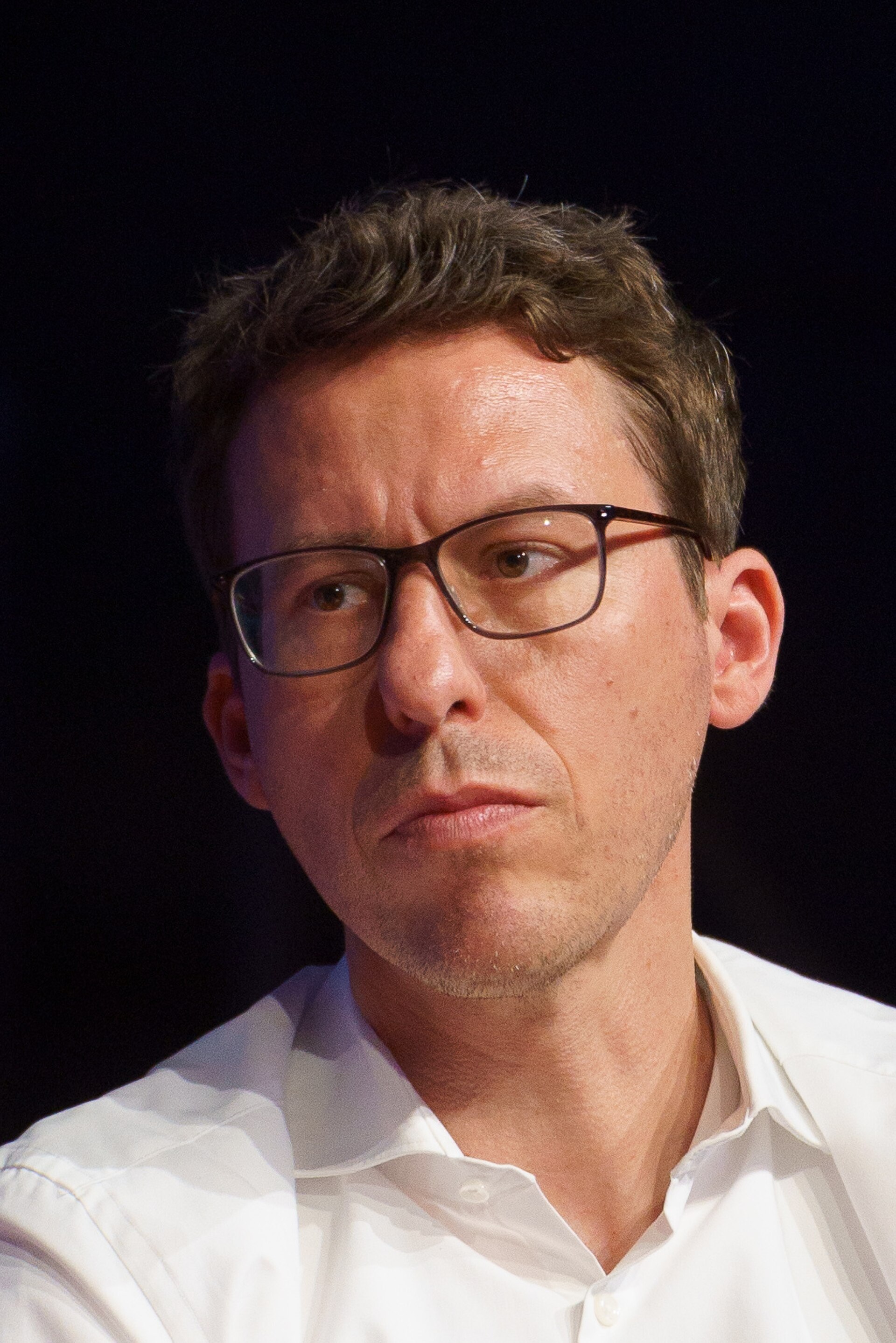 Bastian Obermayer, Co-founder and Director of paper trail media, speaking at the International Journalism Festival 2024 in Perugia, Italy on a panel called How can we pursue the investigations of silenced journalists?.