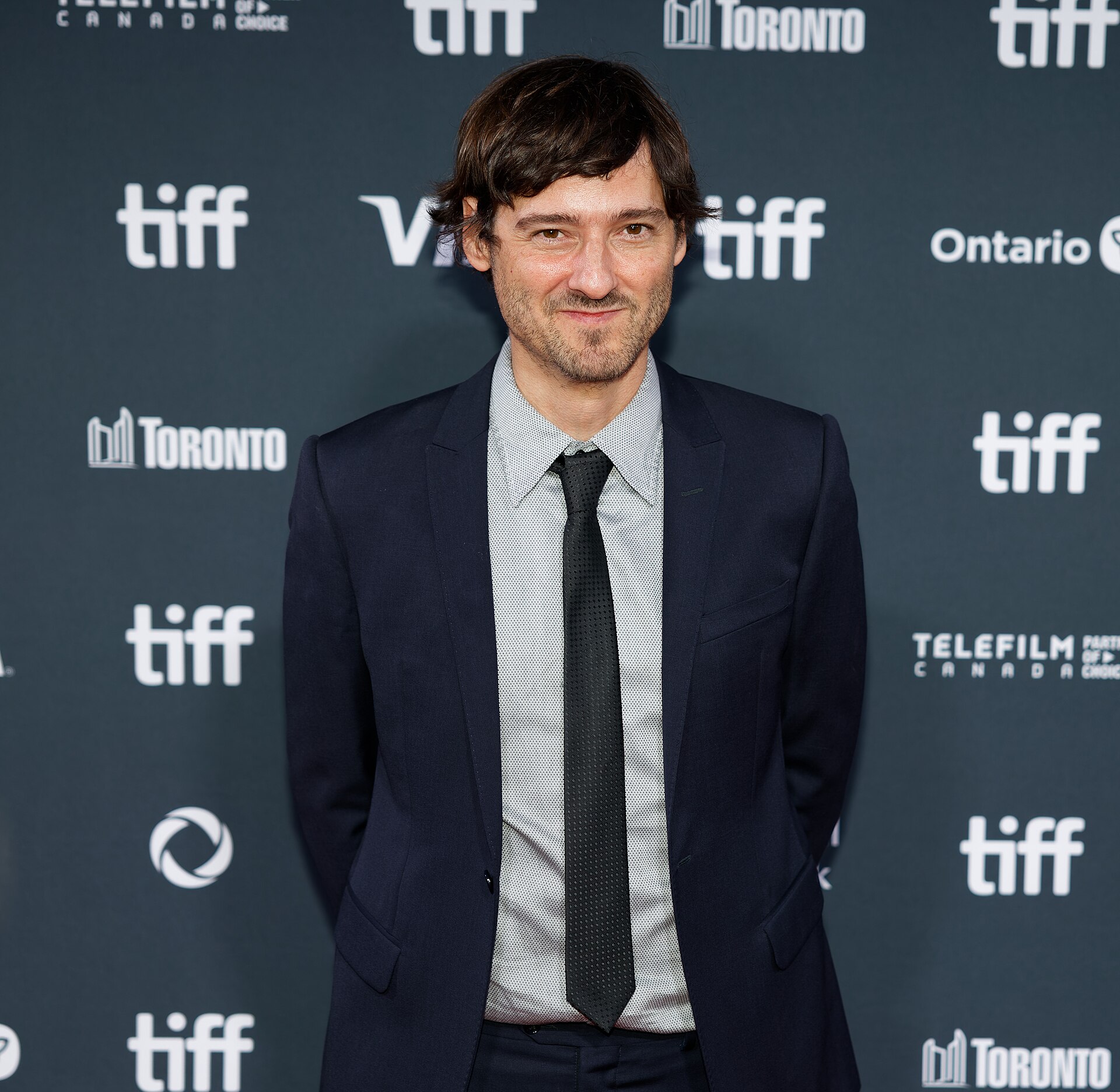 Carlos Marques-Marcet, director, at the 2024 Toronto International Film Festival (TIFF) for the movie They Will Be Dust.