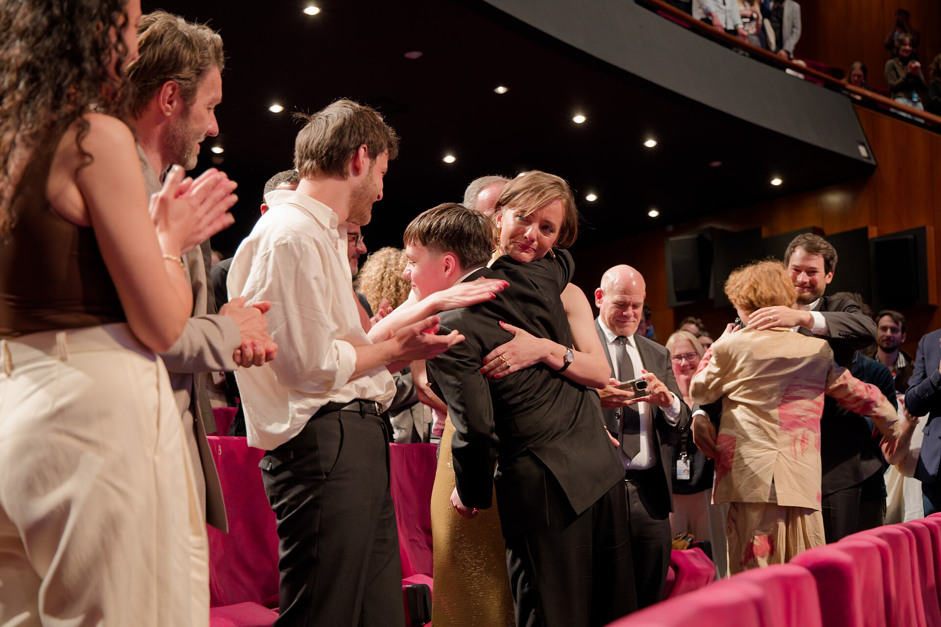 Cast and crew during the standing ovation at the 2025 Cannes Film Festival premiere of The Plague.