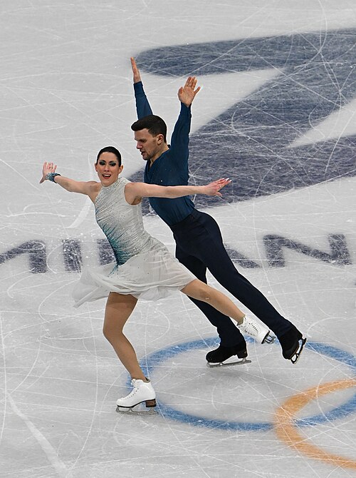 MILAN, ITALY - 07 FEBRUARY 2026: Charlene Guignard and Marco Fabbri of Italy compete during the Figure Skating Team Event Ice Dance-Free Dance at the Olympic Winter Games Milano Cortina 2026  Milano Ice Skating Arena on February 07, 2026 in Milan, Italy