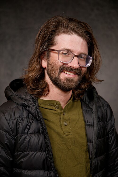 Charles Ziman, mechanical engineer, at the WikiPortraits studio at the 2025 Sundance Film Festival.