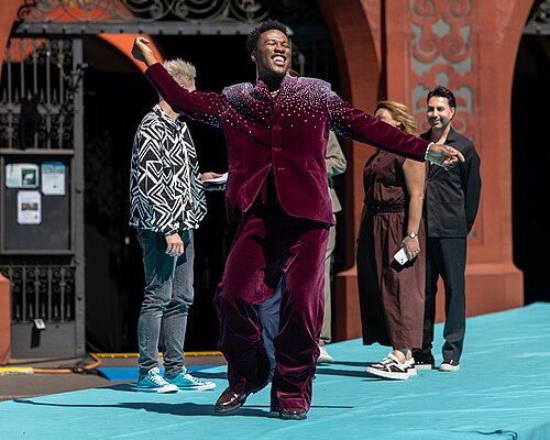 Claude, representing Netherlands, on the Turquoise Carpet at Eurovision 2025 in Basel, Switzerland.