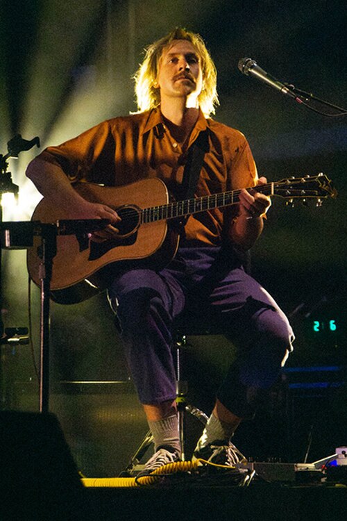 Cook Craig, guitarist for King Gizzard & The Lizard Wizard performing at a concert in 2023.