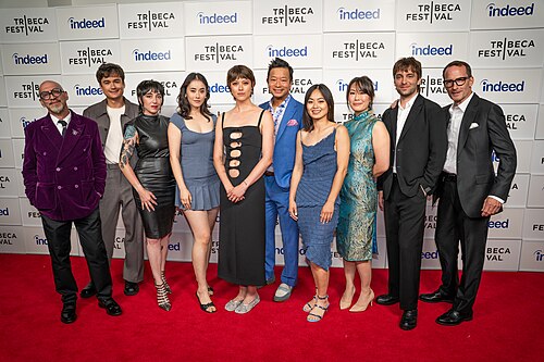 Craig Coletta, Corbett Blair, Melissa LaMartina, Laura Hetherington, Chelsie Pennello, Michael Tow, An-Phuong Ly, May Chen, Robin Groulx, and Ian Lyons at a 2025 Tribeca Film Festival red carpet in New York City for the film Cherry-Colored Funk.