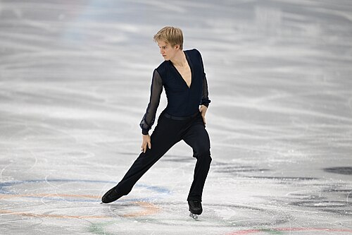 MILAN, ITALY - 10 FEBRUARY 2026: Daniel Grassl of Italy competes during the Figure Skating Men Single Skating Short Program at the Olympic Winter Games Milano Cortina 2026 Milano Ice Skating Arena on February 10, 2026 in Milan, Italy