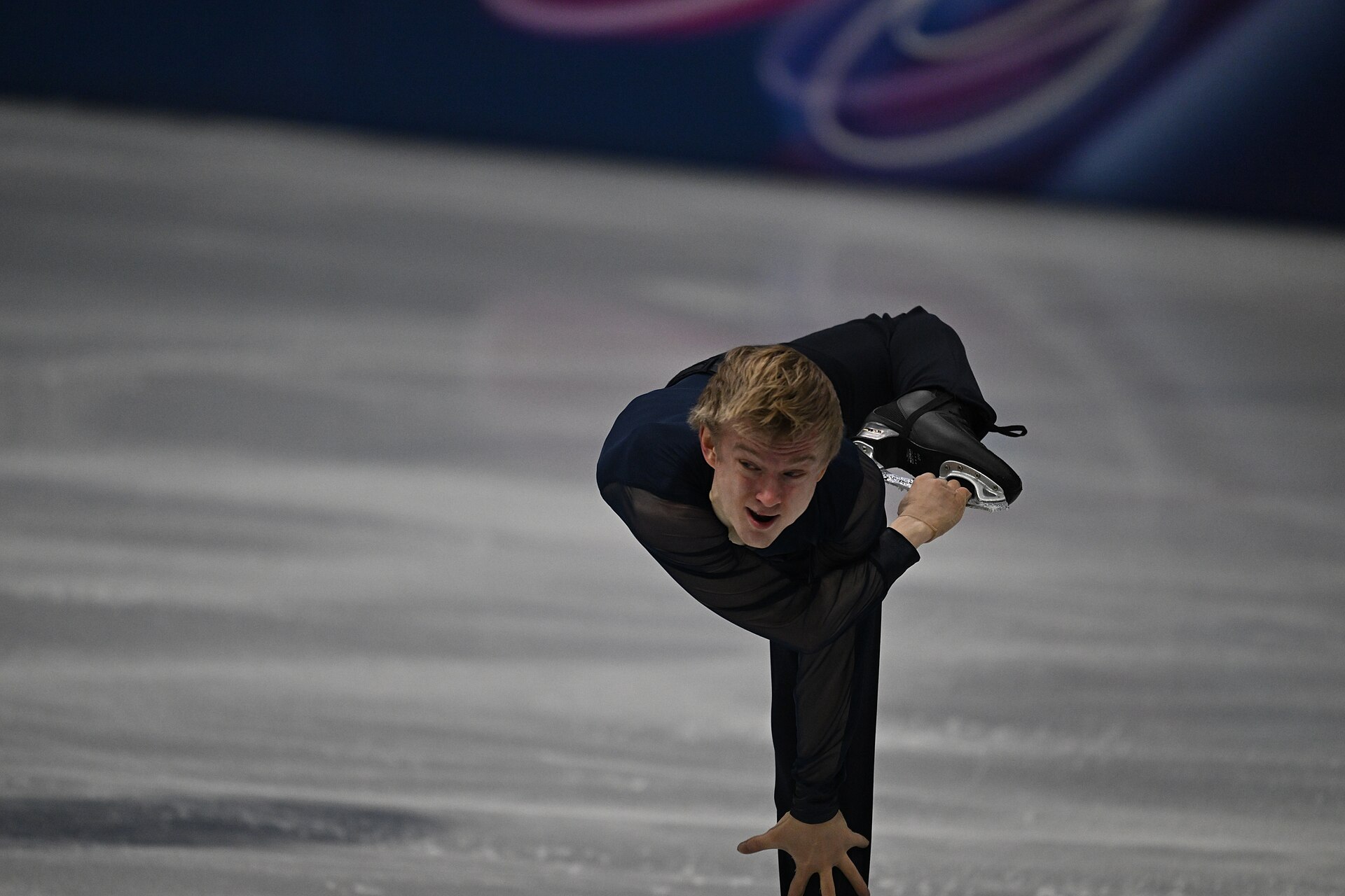 MILAN, ITALY - 10 FEBRUARY 2026: Daniel Grassl of Italy competes during the Figure Skating Men Single Skating Short Program at the Olympic Winter Games Milano Cortina 2026 Milano Ice Skating Arena on February 10, 2026 in Milan, Italy