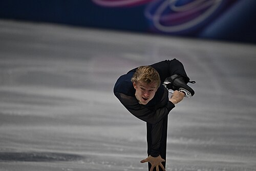 MILAN, ITALY - 10 FEBRUARY 2026: Daniel Grassl of Italy competes during the Figure Skating Men Single Skating Short Program at the Olympic Winter Games Milano Cortina 2026 Milano Ice Skating Arena on February 10, 2026 in Milan, Italy
