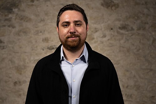 David Rosenthal, Civic Technologist, at the WikiPortraits studio at the 2025 SXSW Festival.