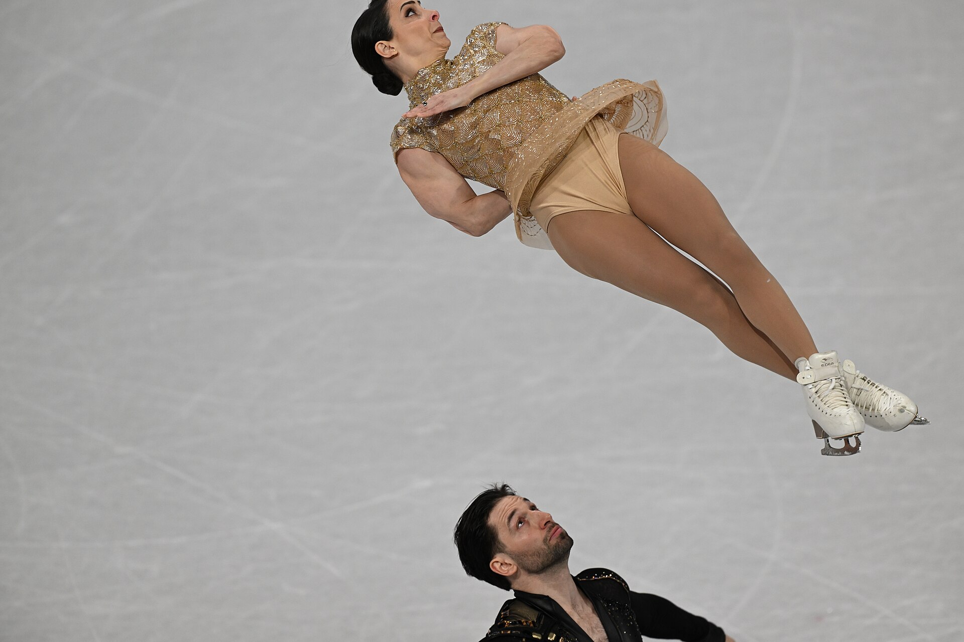 MILAN, ITALY - 15 FEBRUARY 2026: Deanna Stellato-Dudek and Maxime Deschamps of Canada compete during the Figure Skating Pair Skating Short Program at the Olympic Winter Games Milano Cortina 2026 Milano Ice Skating Arena on February 15, 2026 in Milan, Italy
