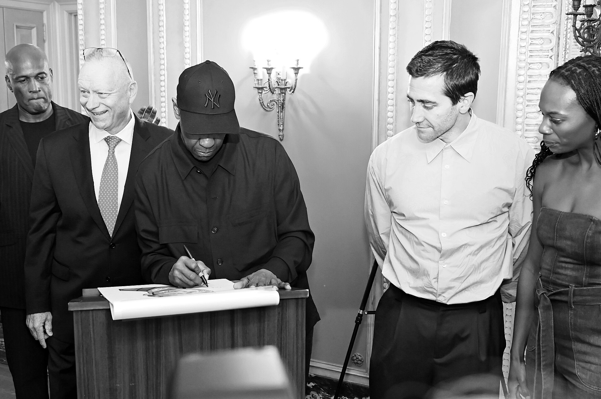 Denzel Washington signing his Sardi's portrait, 2025