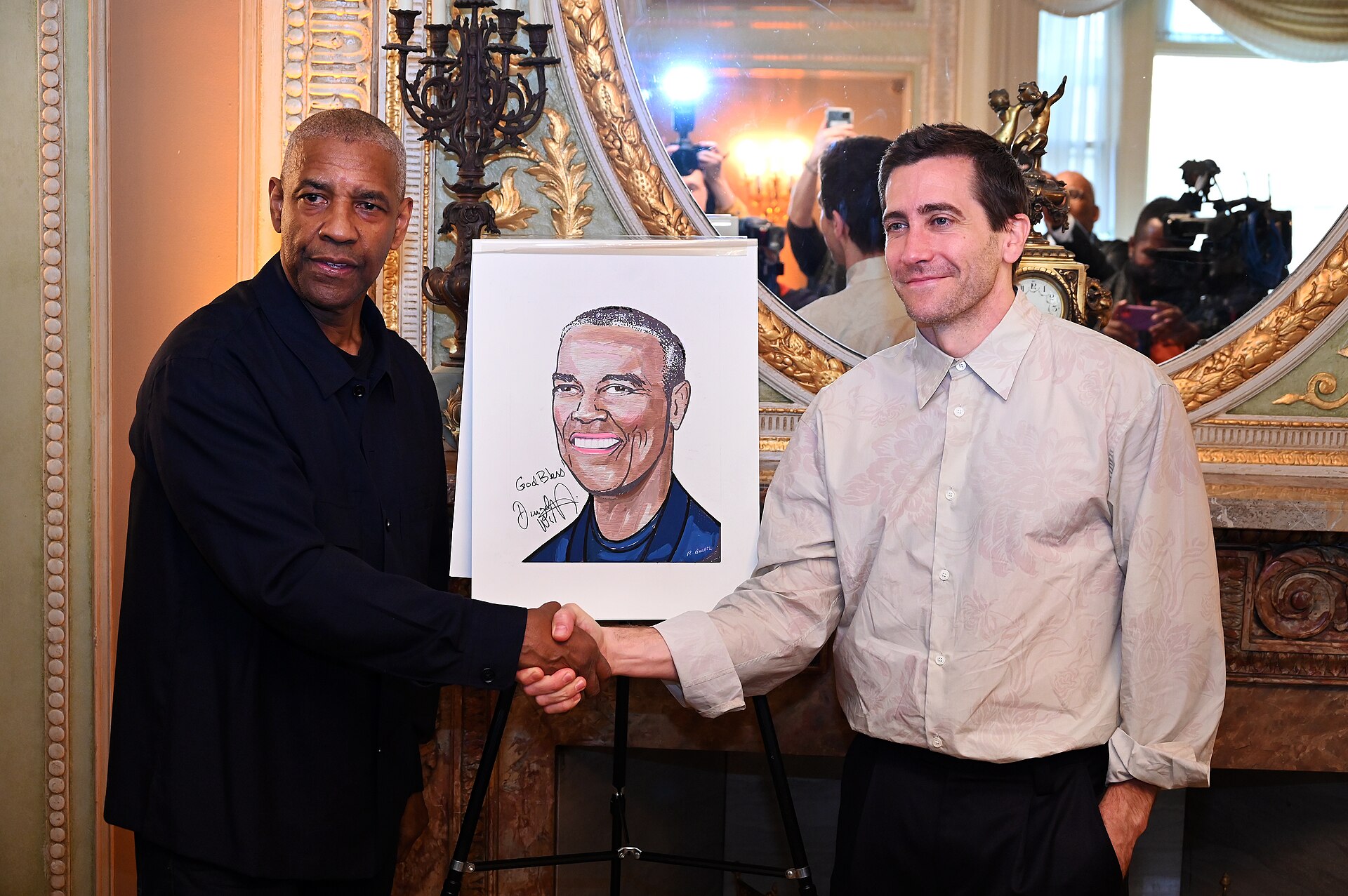 Denzel Washington and Jake Gyllenhaal at the unveiling of Denzel's Sardi's portrait, 2025