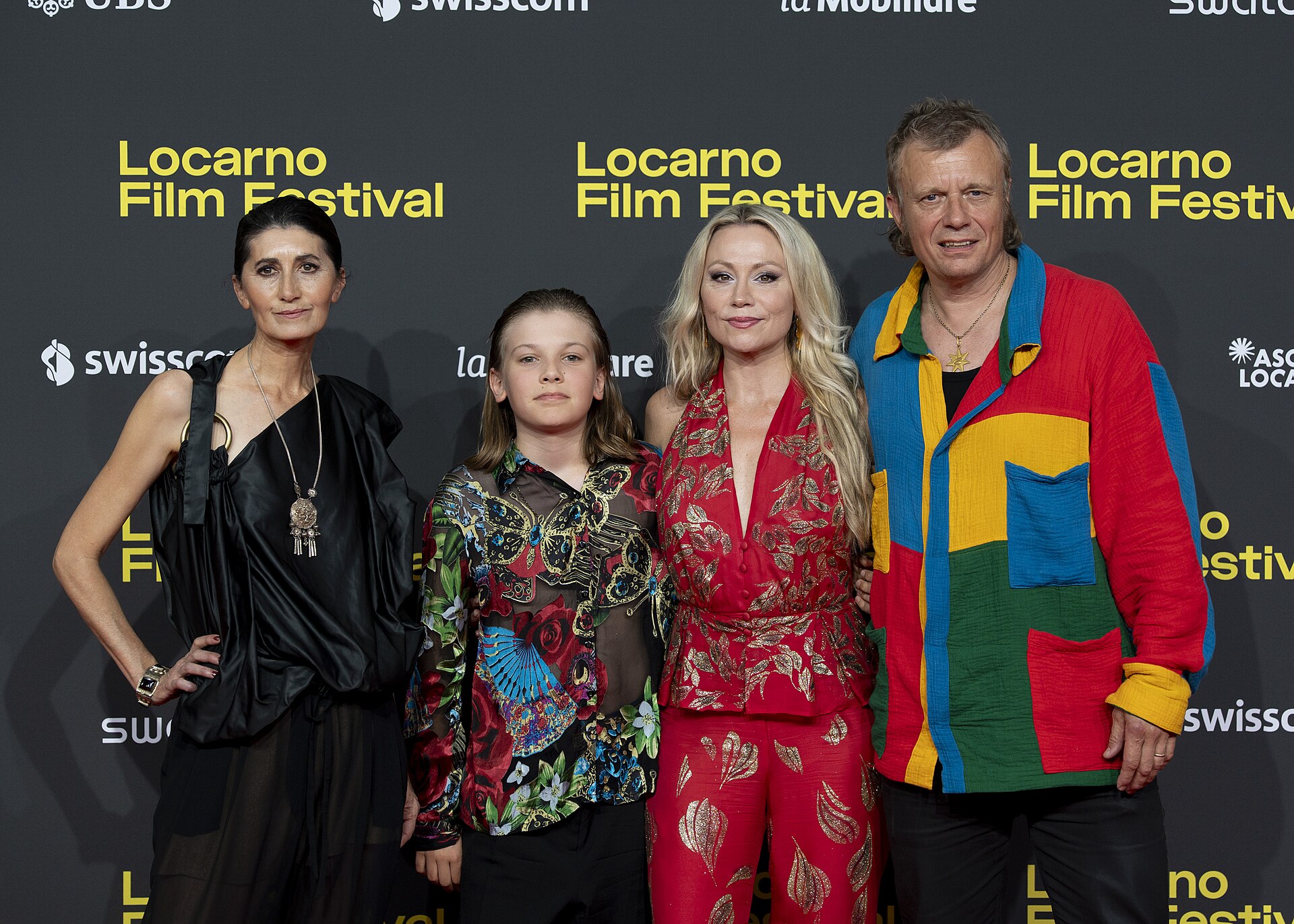 Director Anna Eriksson, producer Matti Pyykkö and cast at the 78th Locarno Film Festival red carpet for E