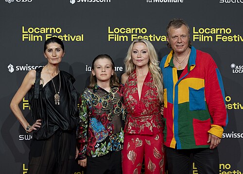 Director Anna Eriksson, producer Matti Pyykkö and cast at the 78th Locarno Film Festival red carpet for E