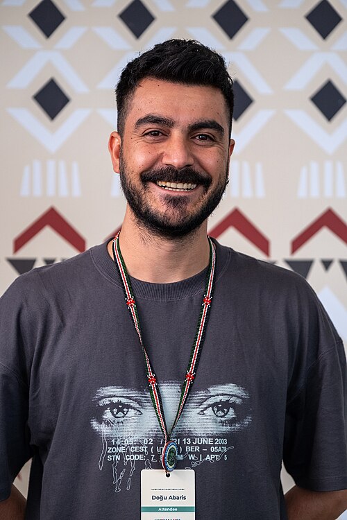 Dogu portrait at Wikimania 2025 WikiPortraits Studio