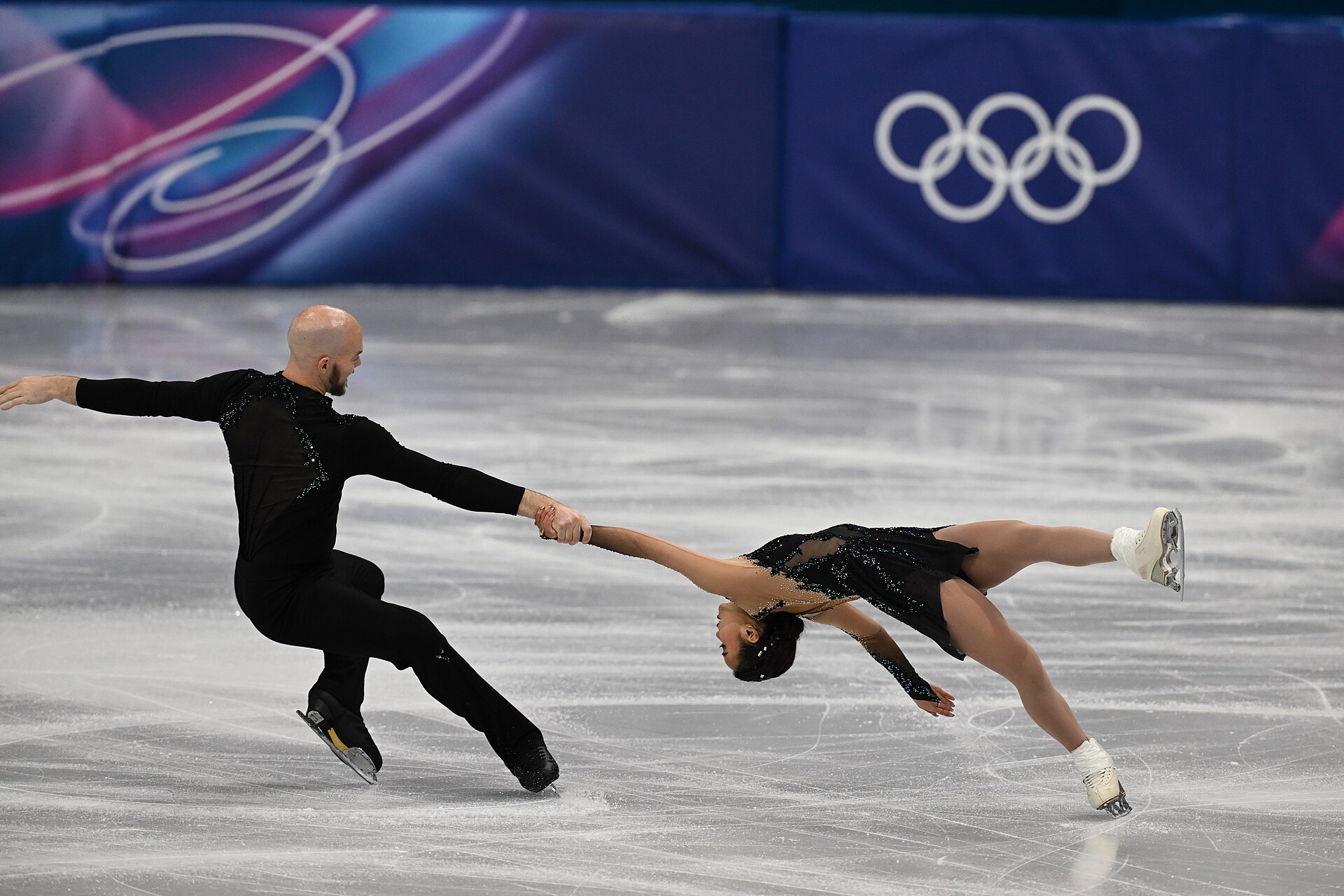 MILAN, ITALY - 16 FEBRUARY 2026: Ellie KAM and Danny O'SHEA of United States compete during the Figure Skating Pair Skating Free Skating at the Olympic Winter Games Milano Cortina 2026 Milano Ice Skating Arena on February 16, 2026 in Milan, Italy
