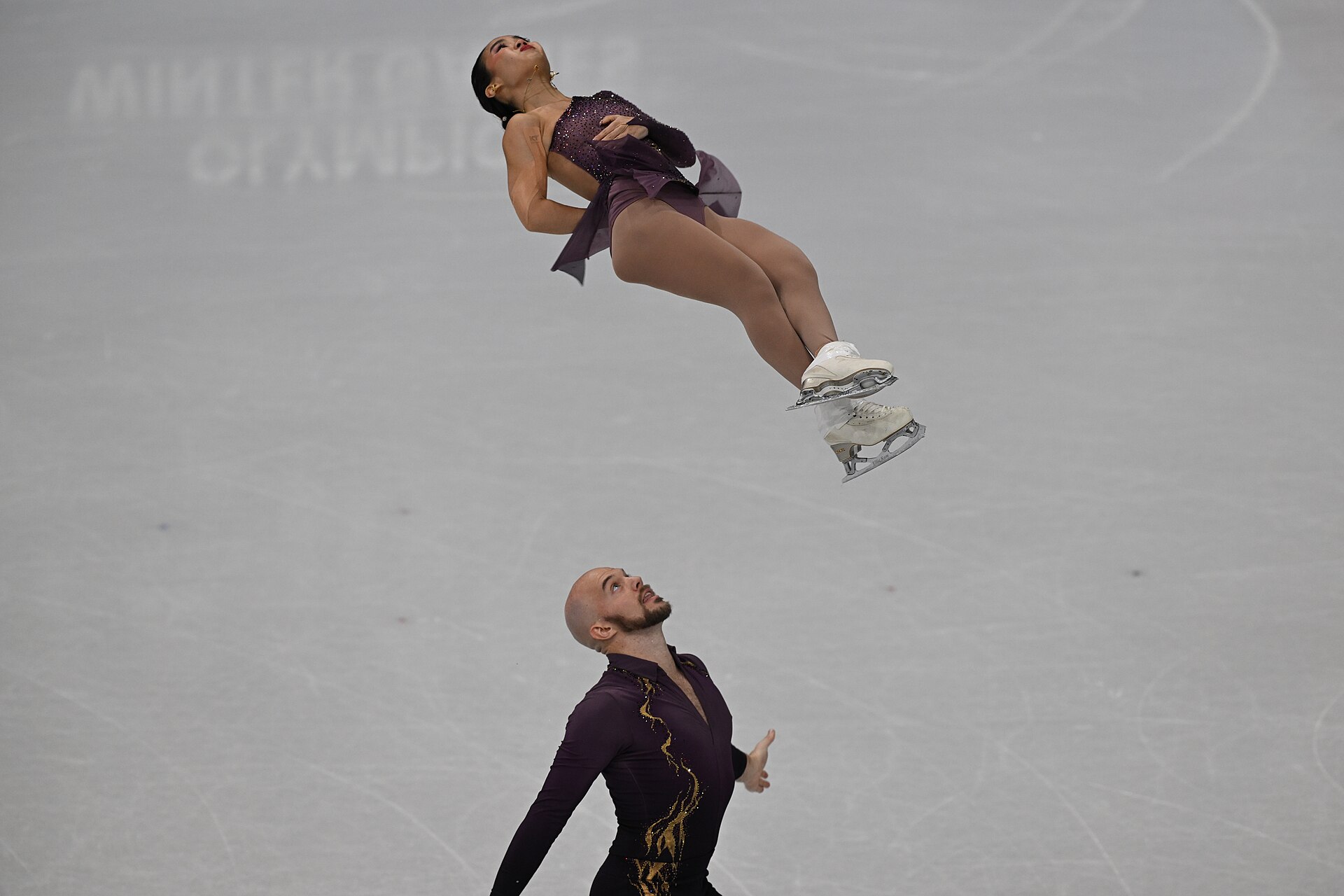 MILAN, ITALY - 15 FEBRUARY 2026: Ellie Kam and Danny O'Shea of United States compete during the Figure Skating Pair Skating Short Program at the Olympic Winter Games Milano Cortina 2026 Milano Ice Skating Arena on February 15, 2026 in Milan, Italy