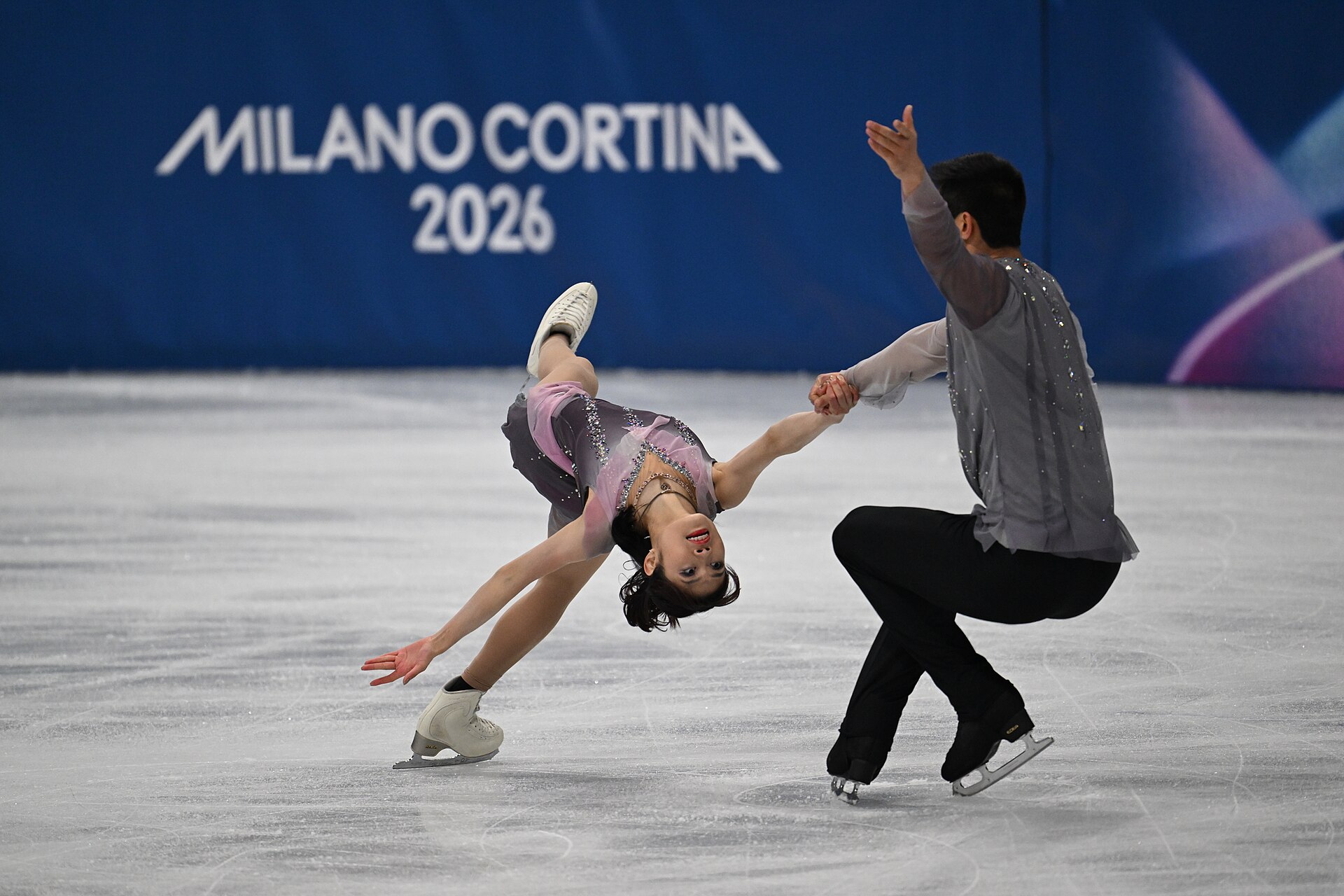 MILAN, ITALY - 16 FEBRUARY 2026: Emily CHAN and Spencer Akira HOWE of United States compete during the Figure Skating Pair Skating Free Skating at the Olympic Winter Games Milano Cortina 2026 Milano Ice Skating Arena on February 16, 2026 in Milan, Italy