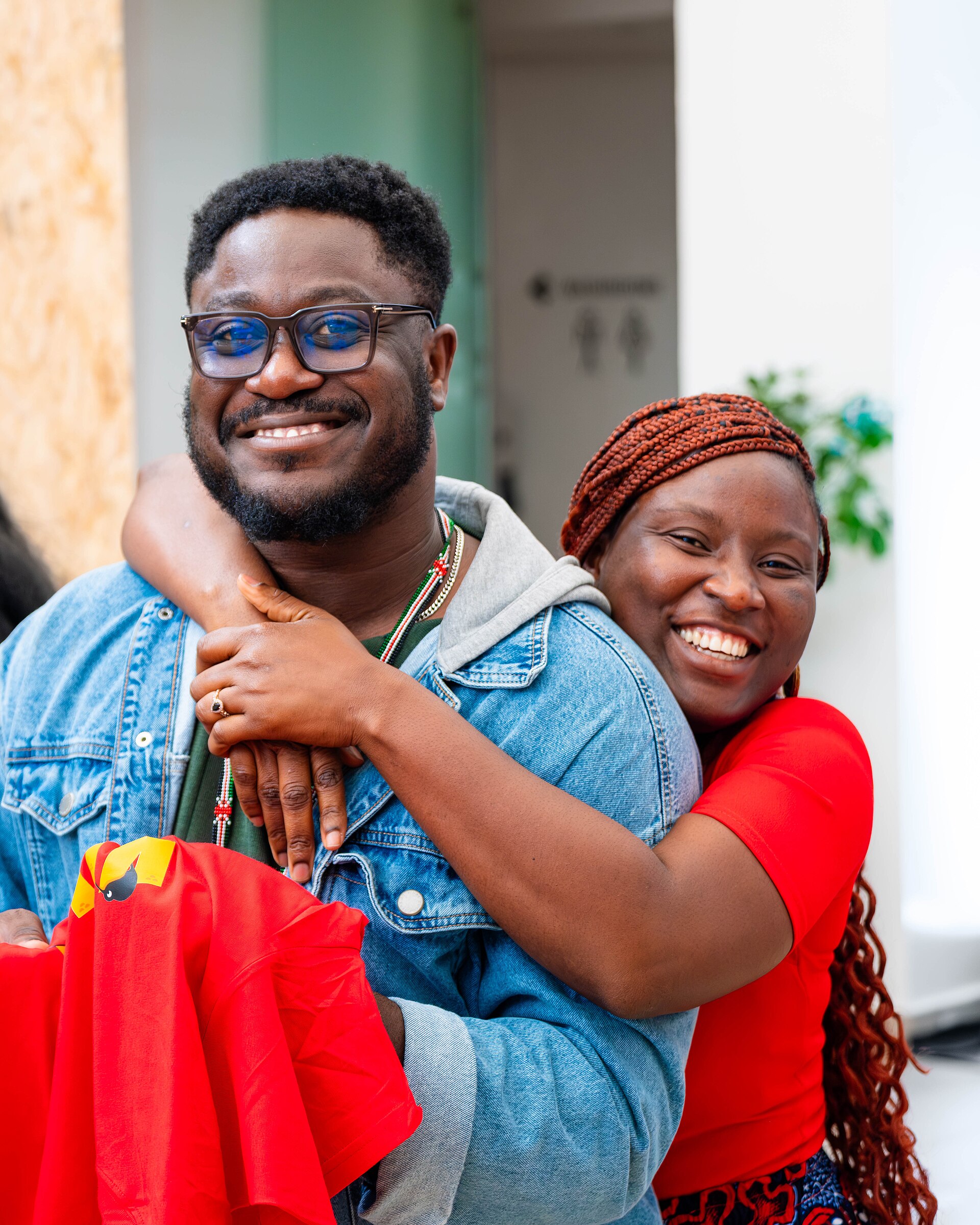 A Photo of Felix Nartey and Jael Boateng at Wikimania 2025 during the poster session