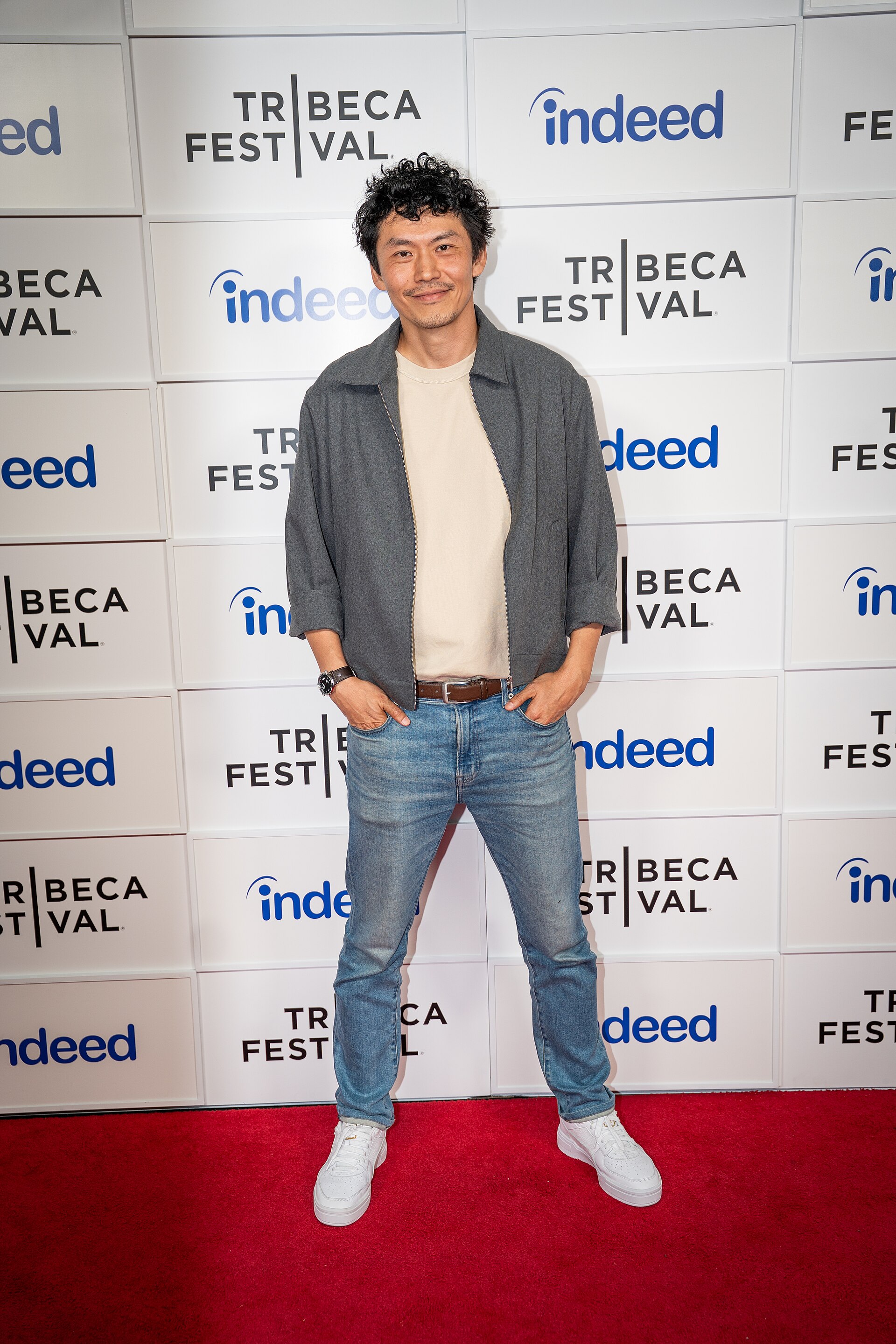 Frank Sun, writer & director, at a 2025 Tribeca Film Festival red carpet in New York City for the film We Are Kings.