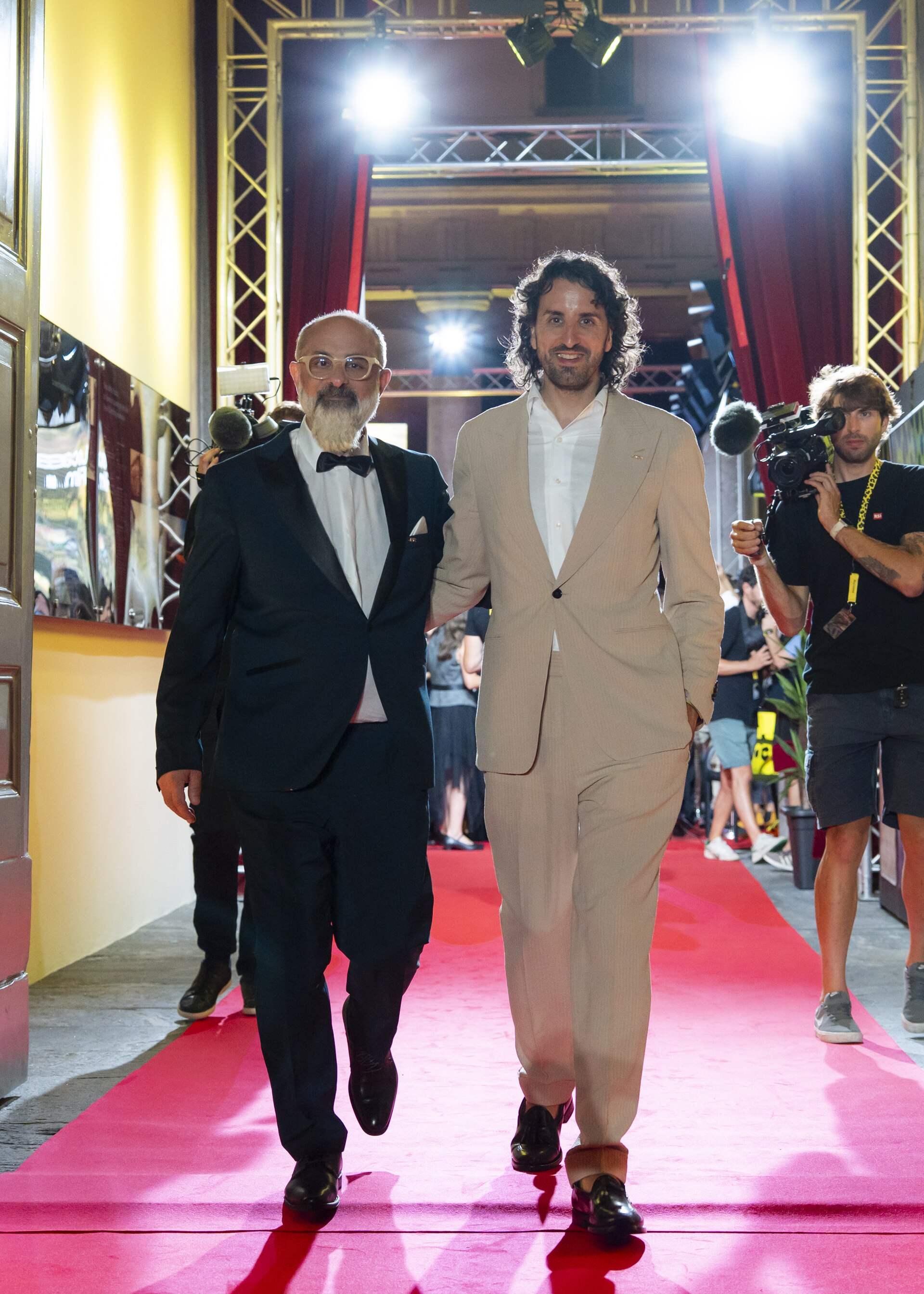 Artistic director Giona A. Nazzaro and CEO Raphael Brunschwig leaving the red carpet at the 78th Locarno Film Festival