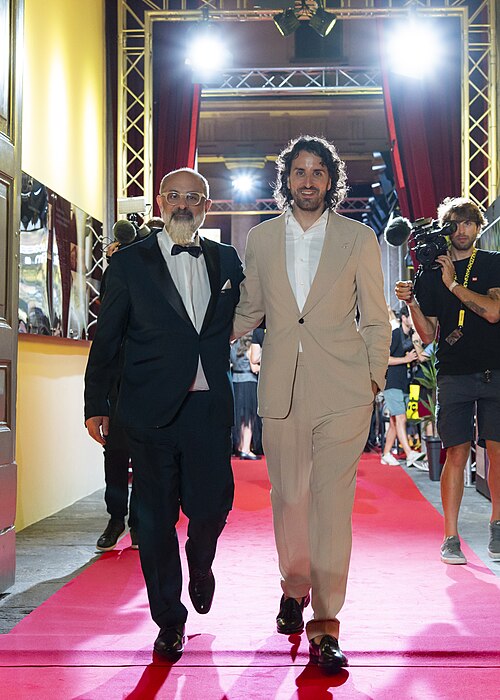 Artistic director Giona A. Nazzaro and CEO Raphael Brunschwig leaving the red carpet at the 78th Locarno Film Festival