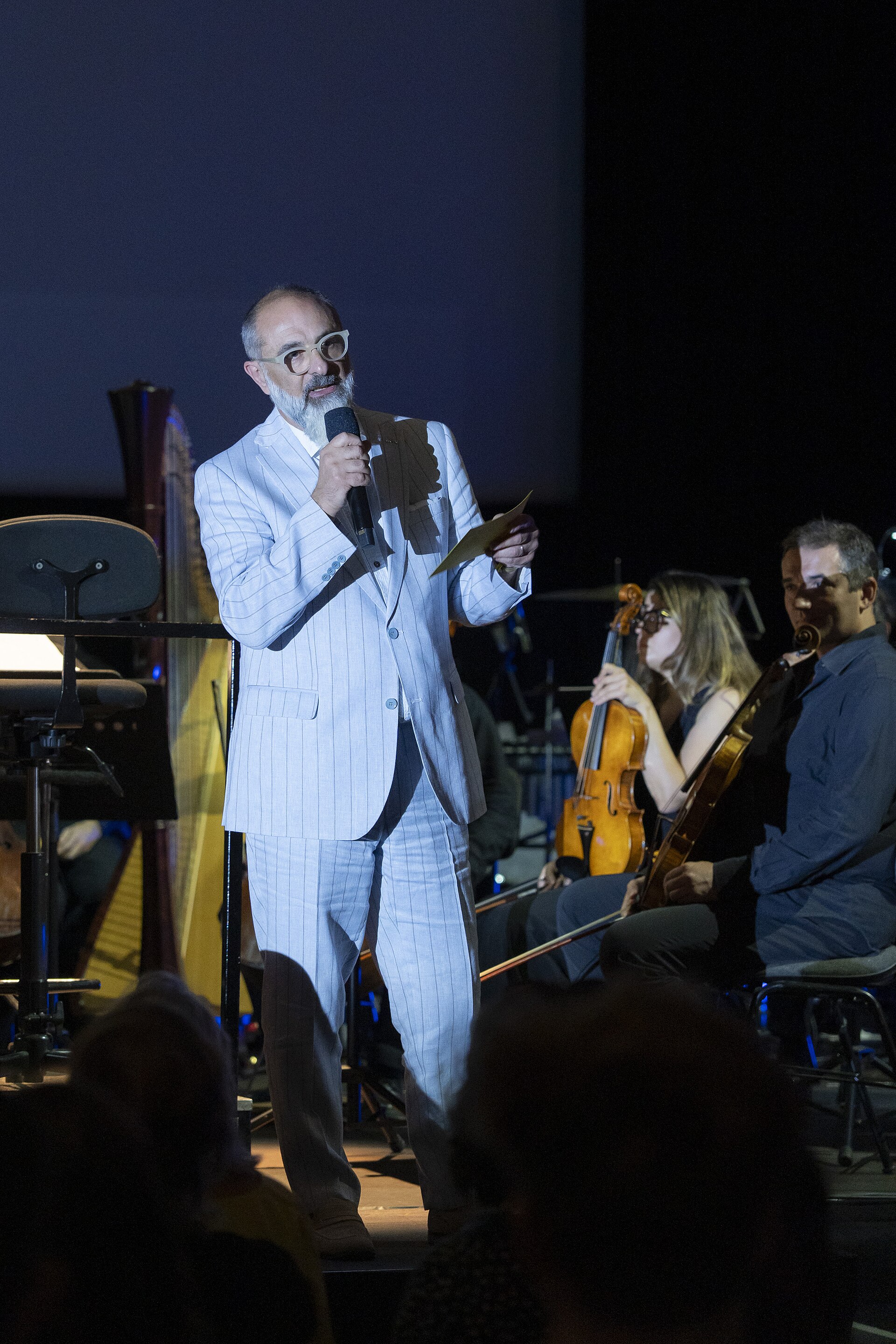 Giona A. Nazzaro introducing the Opening Concert of the 78th Locarno Film Festival with live music performed by the Orchestra della Svizzera italiana.