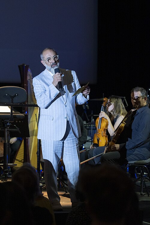 Giona A. Nazzaro introducing the Opening Concert of the 78th Locarno Film Festival with live music performed by the Orchestra della Svizzera italiana.