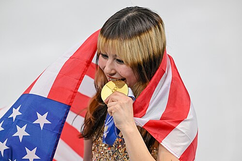 MILAN, ITALY - 19 FEBRUARY 2026: Gold medalist Alysa LIU of Team United States poses for a photo during the medal ceremony for the Women's Single Skating Free Skating at the Olympic Winter Games Milano Cortina 2026 Milano Ice Skating Arena on February 19, 2026 in Milan, Italy