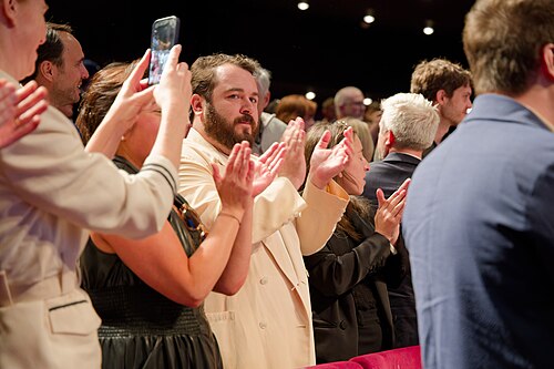 Gus Deardoff during the standing ovation at the 2025 Cannes Film Festival premiere of The Plague.