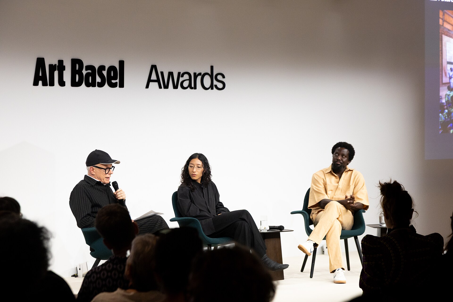 Hans Ulrich Obrist, Lydia Ourahmane, and Ibrahim Mahama at the Art Basel international art fair in Basel, Switzerland in June 2025.
